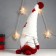 Interior doll "Santa Claus in a red overalls, in a cap with stars" 35x16x14 cm