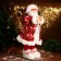 Santa Claus "in a red fur coat with deer, with twigs" 60 cm