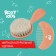 Soft comb, a comb and a scallop with a pile of sheep's wool, peach color