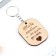A wooden key key, the token "loves you" 3.5 x 4.5 cm