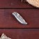Folding “snake” knife, automatic, curly handle