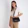 Female bag on one shoulder, on a zipper, black color