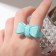 Ring "Bow" voluminous, blue color, size 18
