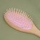 Massage comb, 7 × 22 cm, beige/pink color
