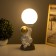 Table lamp "Cosmonaut with moon" 1x40W E14 white/gold 12.5x12.5x31cm