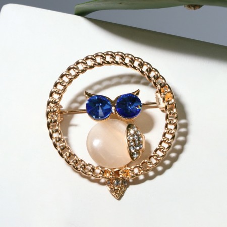 Brooch "Cat Eye" owl, colored in gold