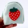 Bag for the doll "strawberries", green color