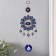 Suspension from the evil eye "Eye in the flower" 7.6x22.5 cm