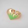 Ring "Heart" fluid, green color in gold, dimensionless