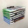 Blu-ray, CD and game disks, wall, black