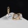 Earrings with bloom rhinestones, white color in gold
