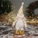Soft toy "Santa Claus in a suit with flowers" 36x19 cm, golden white