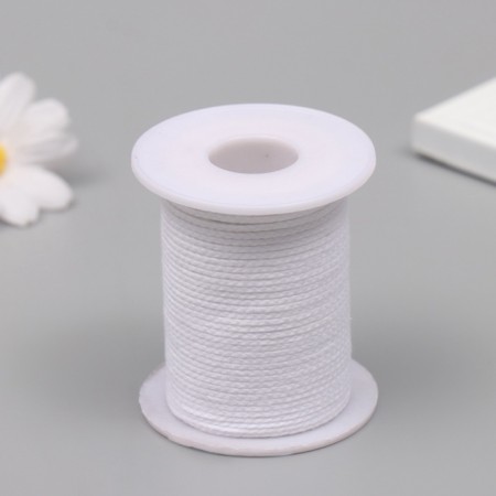 Wick on the bobbin cotton winding 61 m-1