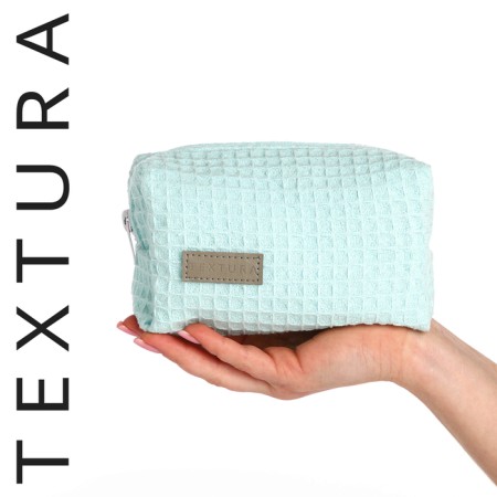 Cosmetic bag at the zipper textura, turquoise color