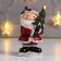 Polystone souvenir "Santa Claus in a red fur coat, with a Christmas tree" 10.5x5x7 cm