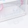 A cage for rodents with a plastic fortification of 47 x 30 x 32 cm, white