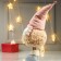 Interior doll "Grandpa in a fur coat and pink cap" 48x16x21 cm