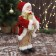 Santa Claus "in a golden red suit, with a strap, with gifts" 15x30 cm