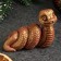 Figure "Snake Spiral" burgundy with gilding, 4x7x4cm