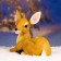 Garden figure "Lying Olenienok" from the polystone good souvenirs, 37cm, medium, brown