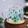 Glass mug with a lid "New Year brings happiness", 350 ml