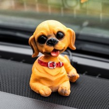 Dog on a car panel shocking his head, SP15