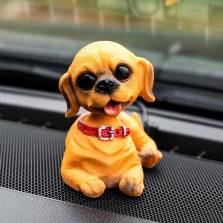 Dog on a car panel shocking his head, SP15