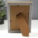 Photo frame plastic 10x15 cm "Golden spiral on black" 17.8x12.8 cm