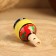 Whistle "Kolobok in a handkerchief", wood, mix