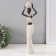 Polystone souvenir "African with a wicker round jug" white 10x6x28 cm