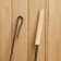 Set of ash and poker with a wooden handle