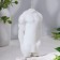 Figure candle "Male silhouette" in a apron with a heart, 5.5x3.5x10.5 cm, white