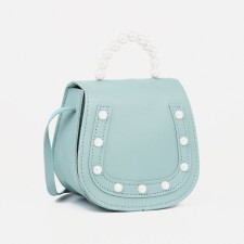 Baby bag on a magnet, the color is light turquoise