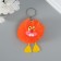Fluffy on the ring "Zubastik" orange 7.6x6x6 cm