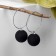 Earrings Assorted "Snowball" in the ring, black color in silver