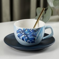 Tea couple ceramic with a spoon 