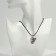 Pendant on the lace "lizard", color black silver on a black lace, 40 cm