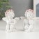 Polystone souvenir "Snowty Angel in a pink wreath sits" mix 6x3.5x4.9 cm
