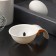 Divator for eggs with a valve fixer, 11 × 7.5 × 3.5 cm, white color
