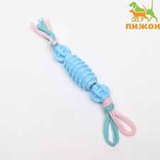 A toy-leaf on a rope with balls 