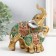 Polystone souvenir "Elephant with an elephant - Red -green ass with rubies" 13.5x8.5x15.5 cm