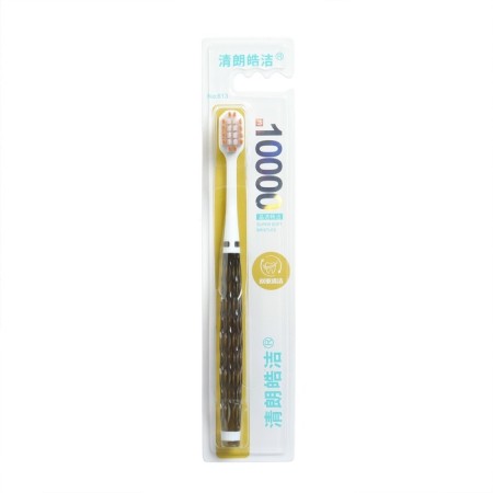 Adult toothbrush with a wide head and soft bristles, transparent, gray