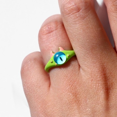 Ring "Montrustrik" with horns, the color is green, dimensionless-2