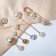 A set of pins (6 pcs.) “Pearl Assorted”, 6.5 cm, white color in gold