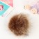 Pompon artificial fur "raccoon" d = 13 cm