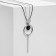Pendant "chain" totem, ring with a needle, black color in silver, 70cm