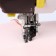 A paw for sewing machines, with a side knife for cutting the edge, 7.2 × 3 × 3.7 cm