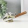 Polystone souvenir "Sinichka sit on a shovel, with flowers" 17x5x7 cm