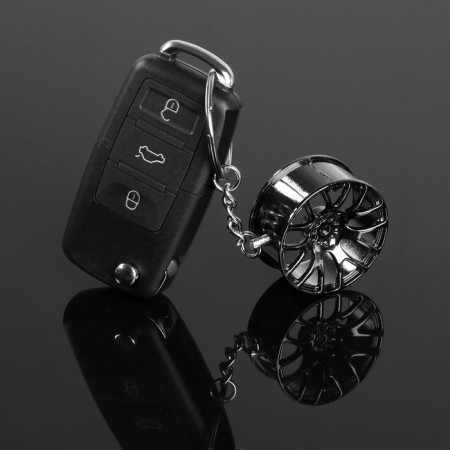 Cartage keychain, disk, metal, dark chrome