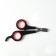 Coger scissors with an emphasis for a finger, a hole of 6 mm, black with red